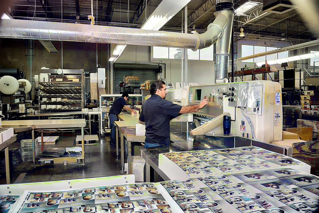 Bindery Equipment Modern Postcard employee working on bindery equipment