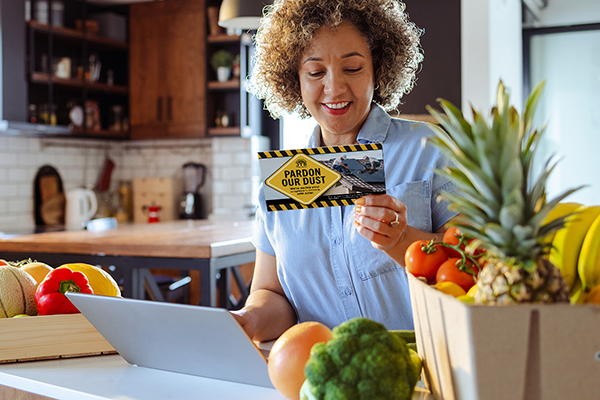 A shows a woman at home reading direct mail sent through a retargeting campaign